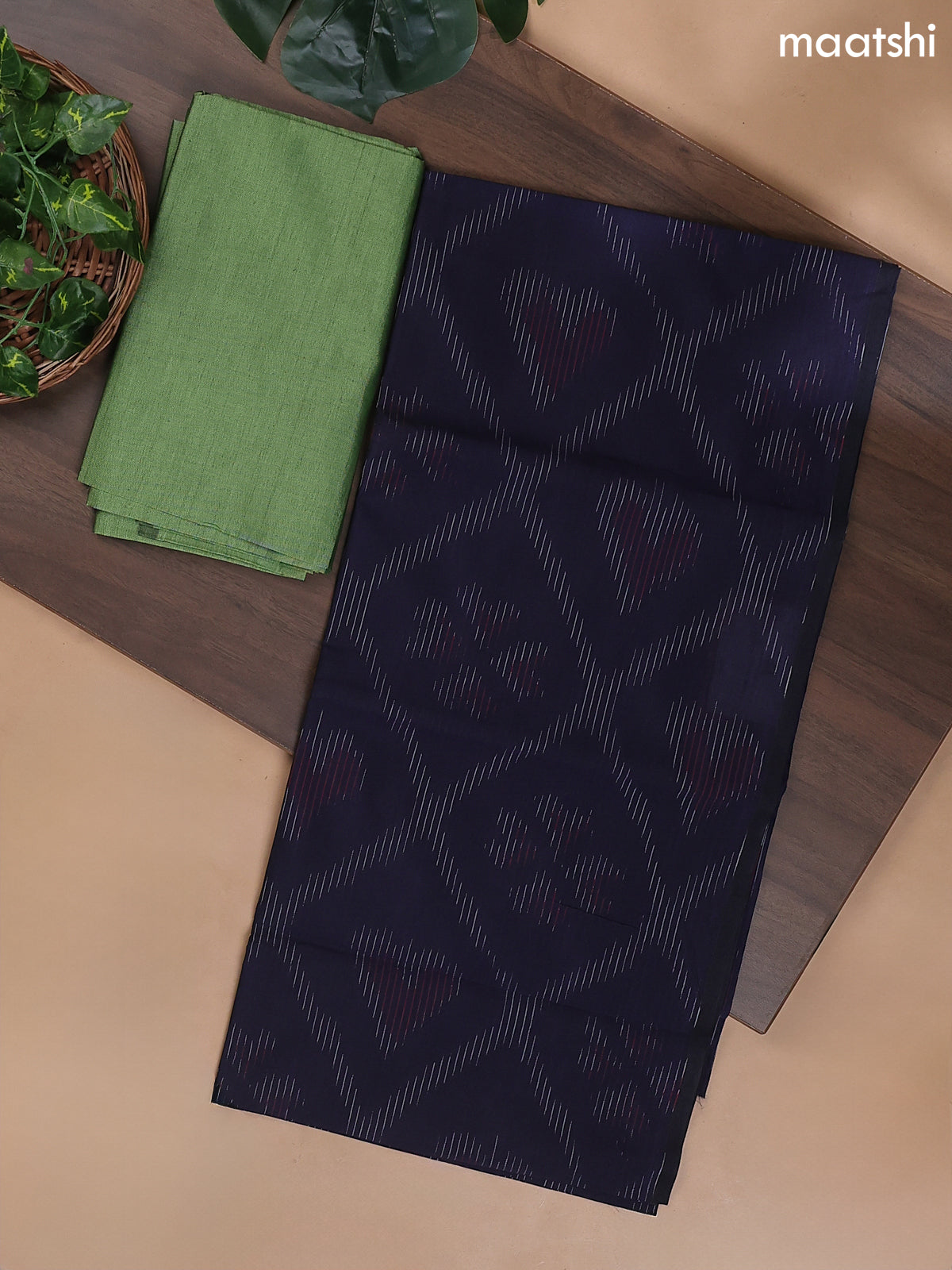 Navy Blue and Pastel Green Ikat Dress Material With Ikat Weaves