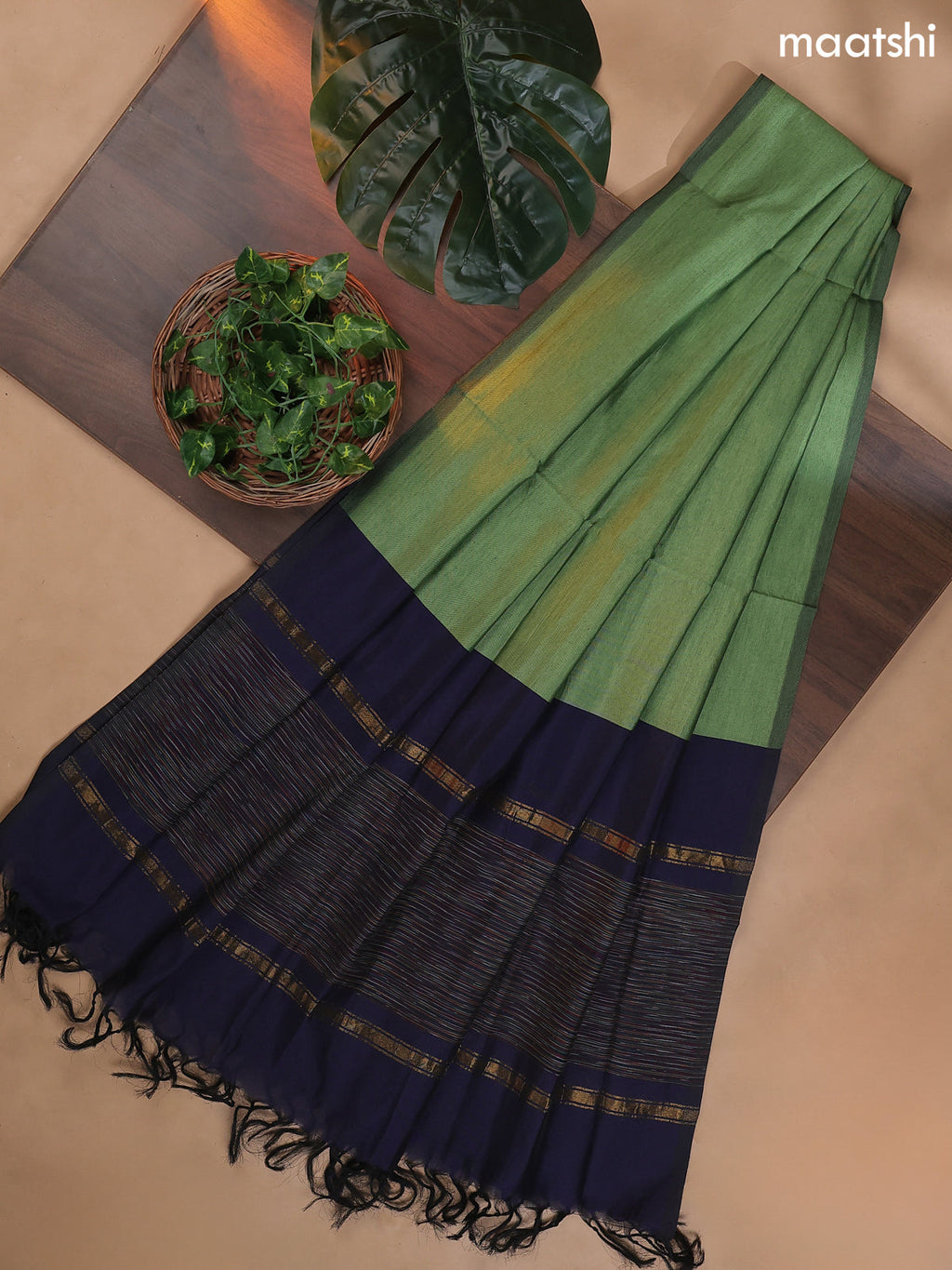Navy Blue and Pastel Green Ikat Dress Material With Ikat Weaves