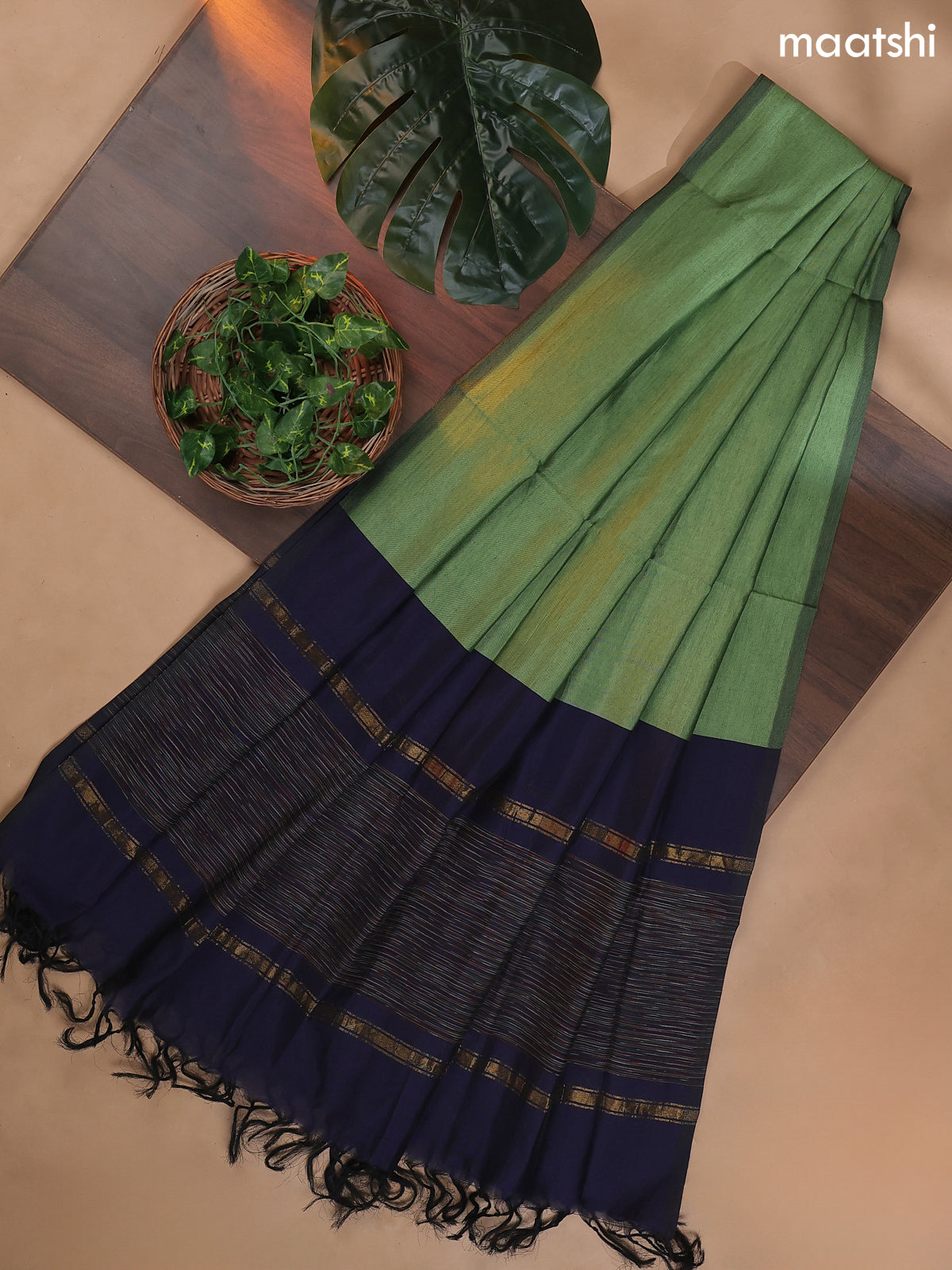 Navy Blue and Pastel Green Ikat Dress Material With Ikat Weaves