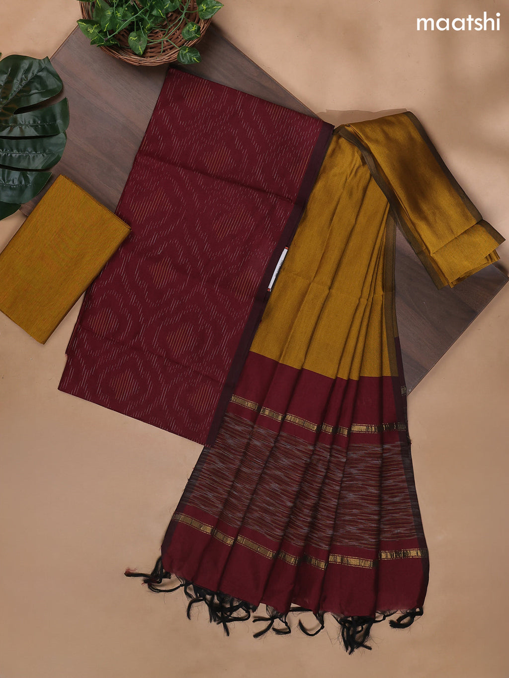 Maroon and Dark Mustard Ikat Dress Material With Ikat Weaves