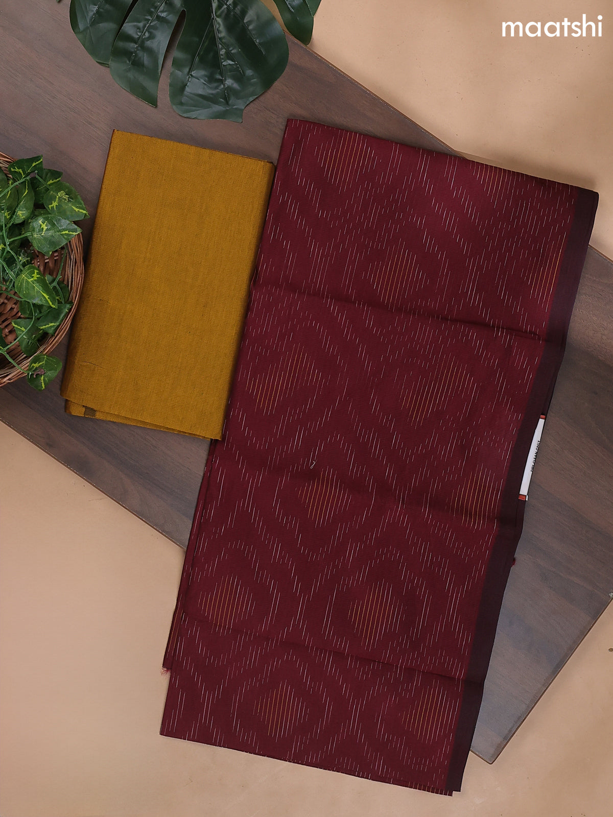 Maroon and Dark Mustard Ikat Dress Material With Ikat Weaves