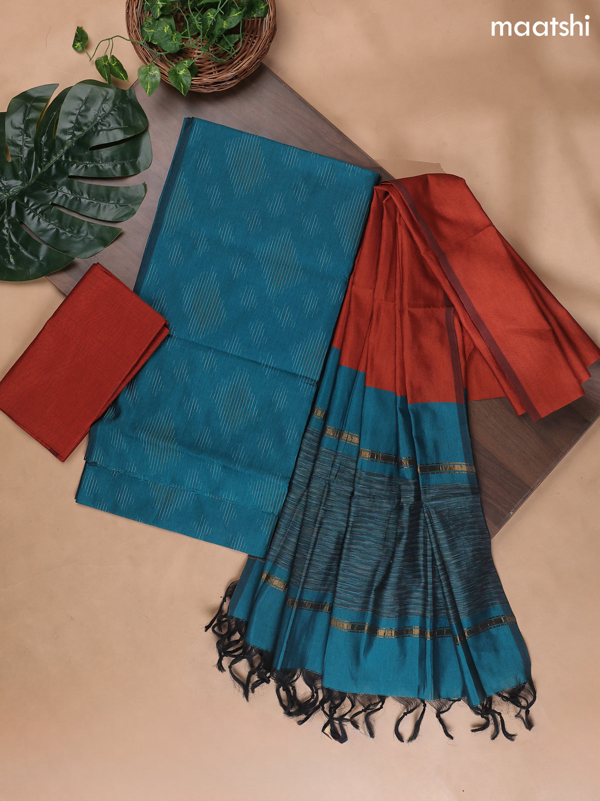 Teal Blue and Rust Ikat Dress Material With Ikat Weaves