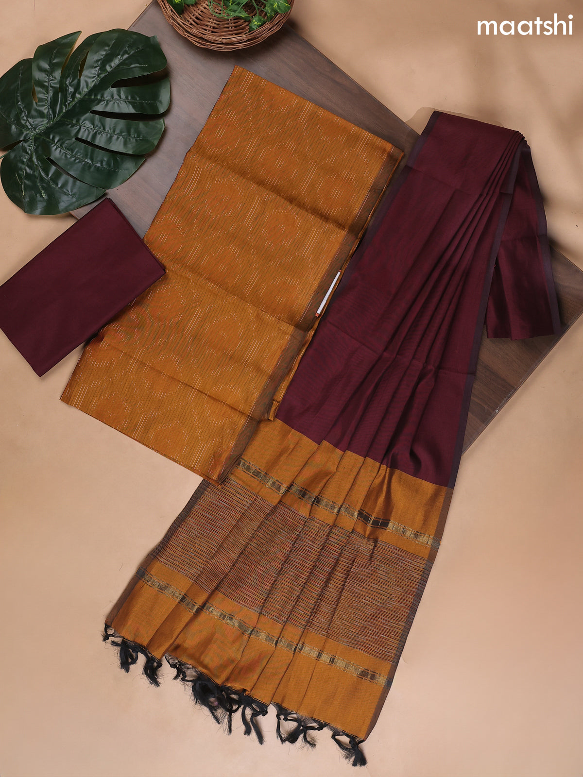Dark Mustard and Deep Maroon Ikat Dress Material With Ikat Weaves