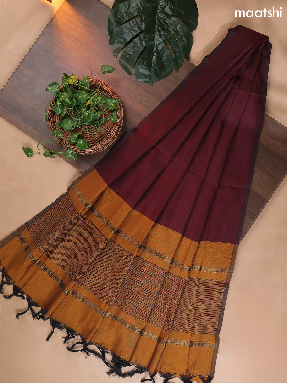 Dark Mustard and Deep Maroon Ikat Dress Material With Ikat Weaves