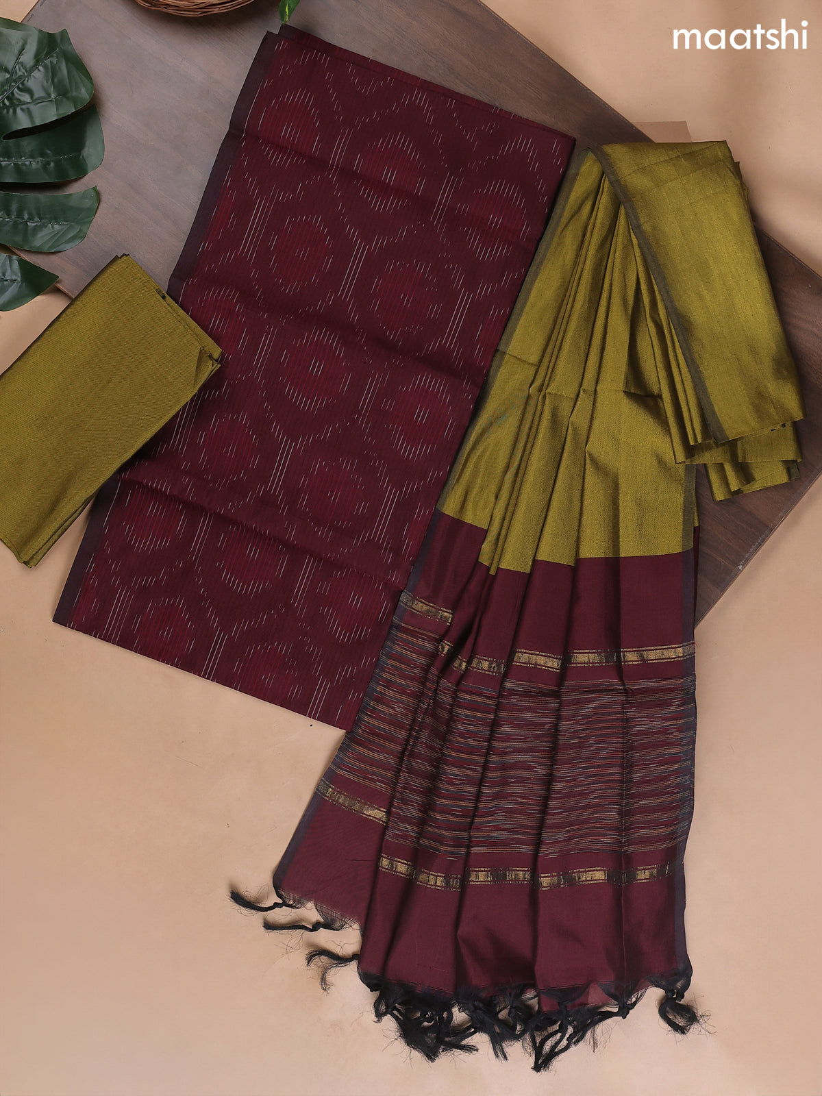 Deep Maroon and Mehendi Green Ikat Dress Material With Ikat Weaves
