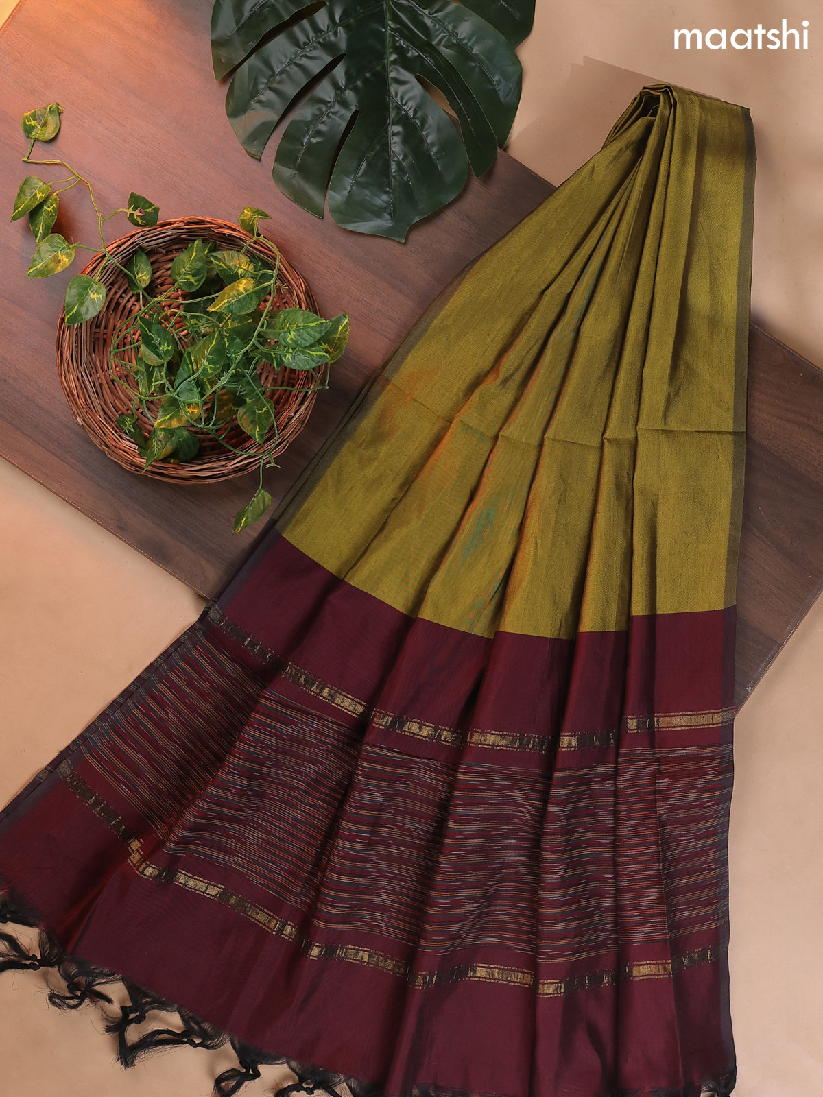 Deep Maroon and Mehendi Green Ikat Dress Material With Ikat Weaves