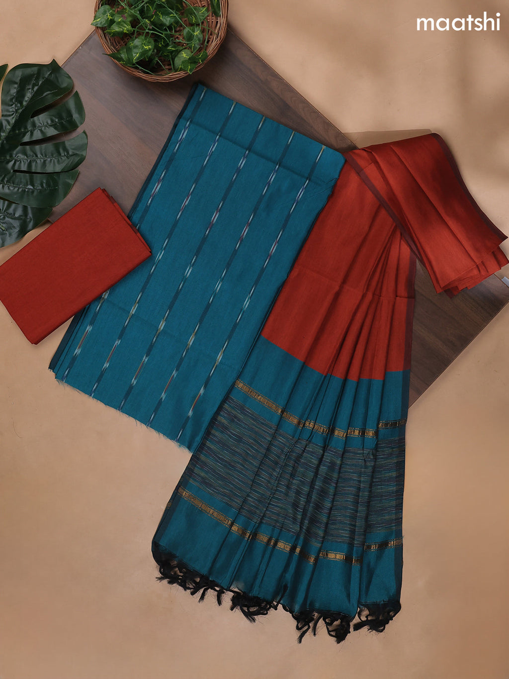 Teal Green and Rust Ikat Dress Material With Ikat Weaves