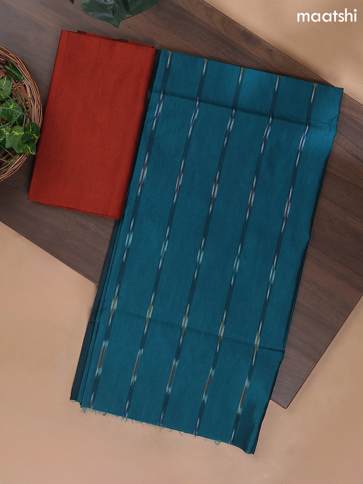 Teal Green and Rust Ikat Dress Material With Ikat Weaves
