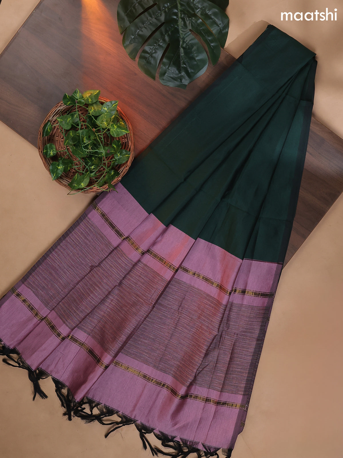 Mauve Pink and Dark Green Ikat Dress Material With Ikat Weaves