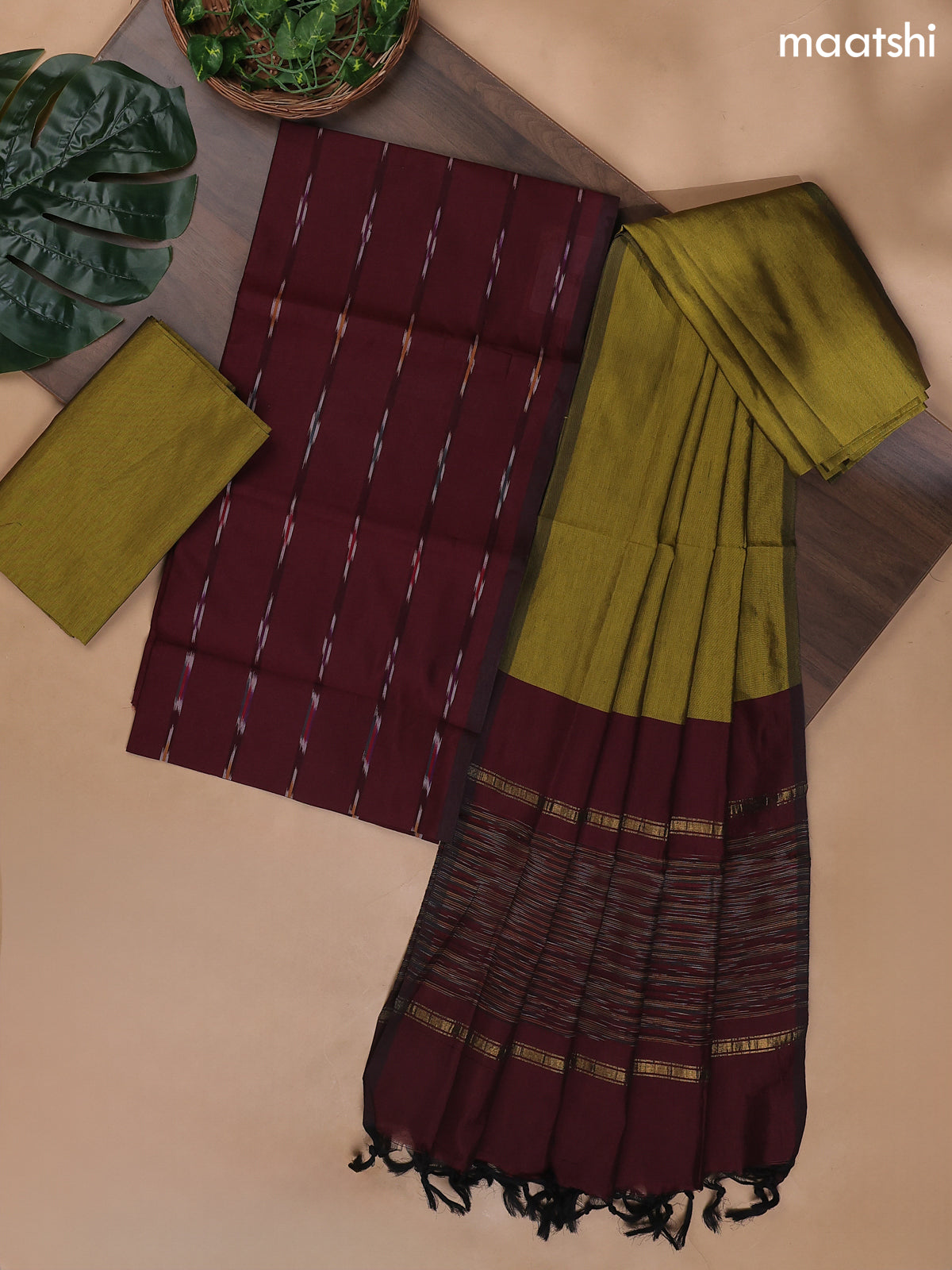 Deep Maroon and Mehendi Green Ikat Dress Material With Ikat Weaves