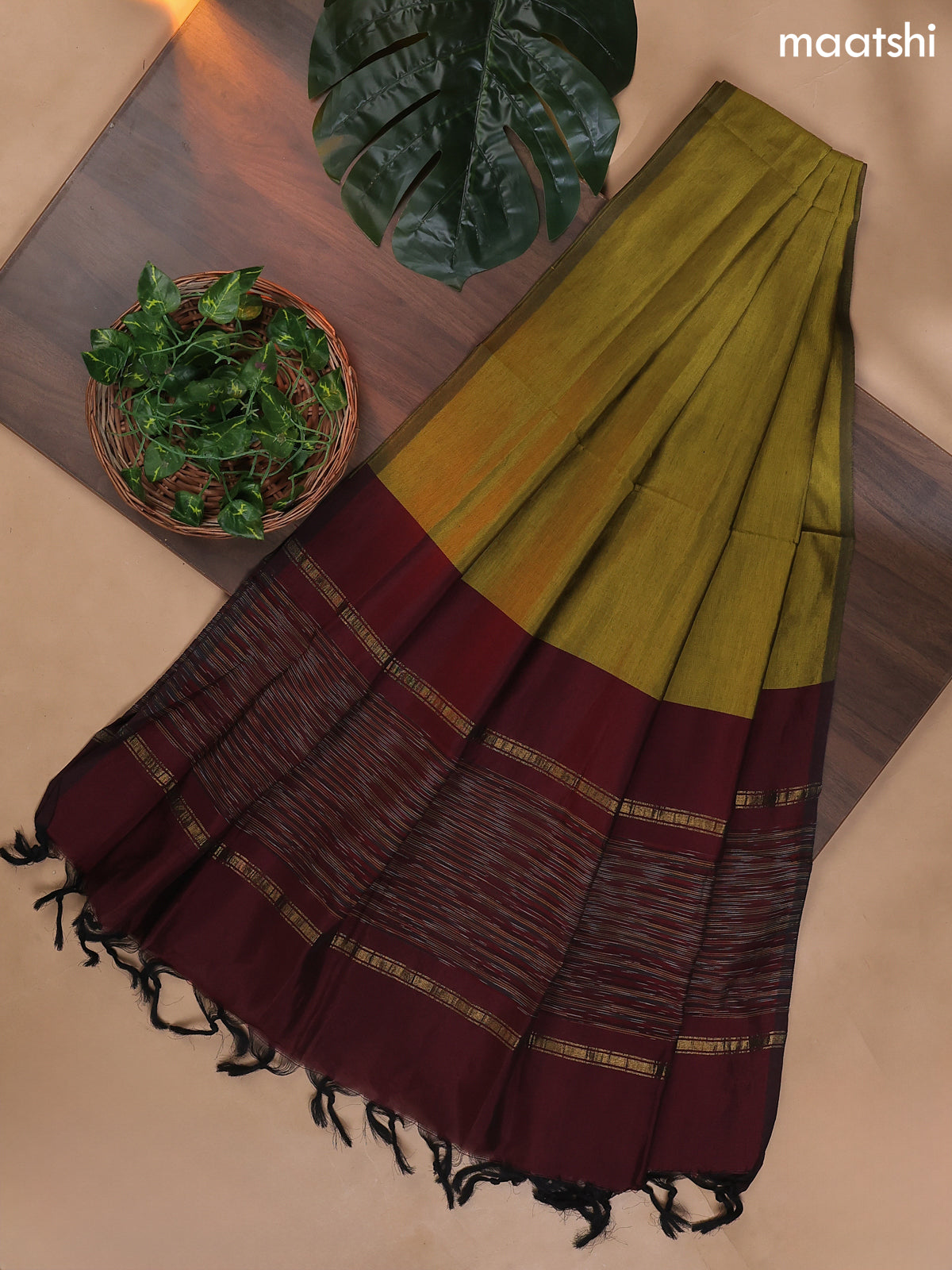 Deep Maroon and Mehendi Green Ikat Dress Material With Ikat Weaves