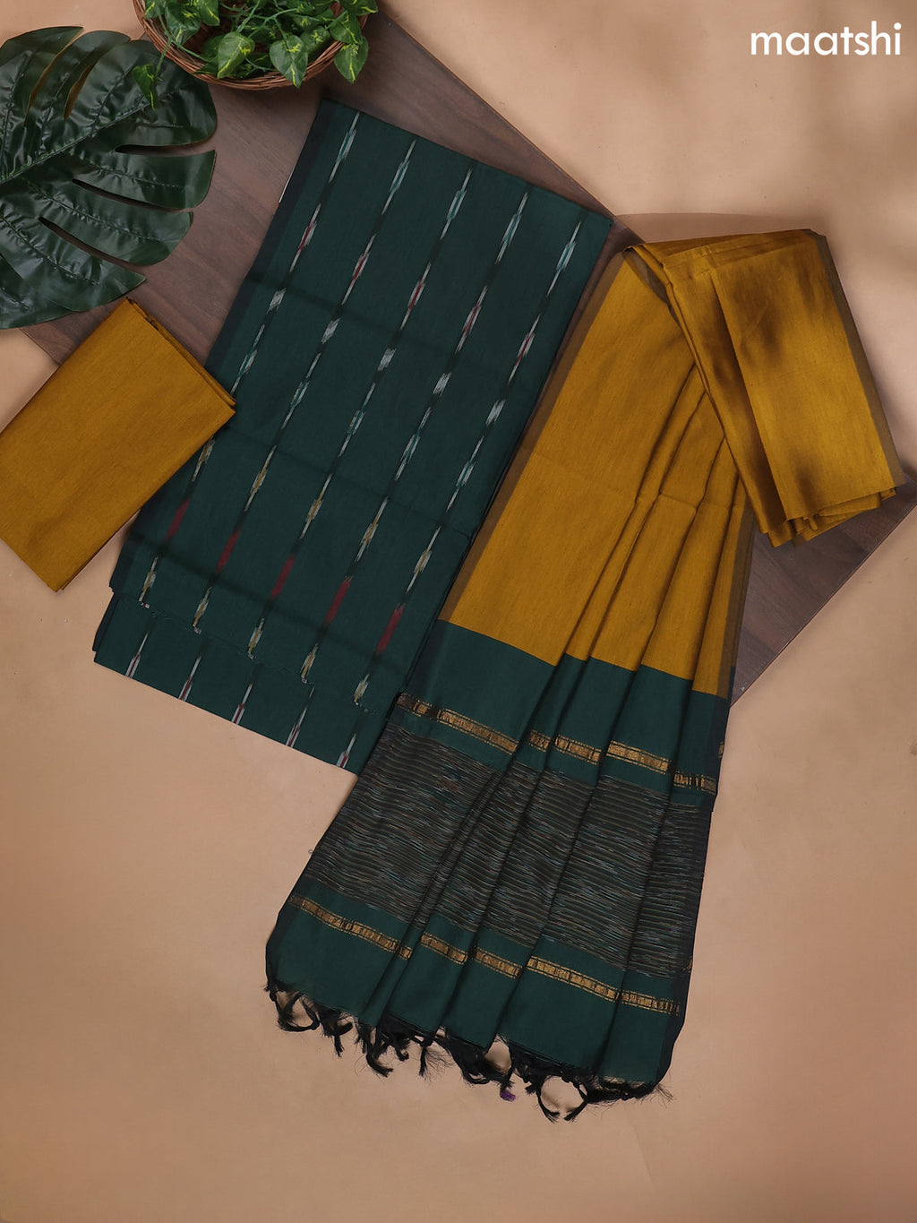 Green and Mustard Yellow Ikat Dress Material With Ikat Weaves