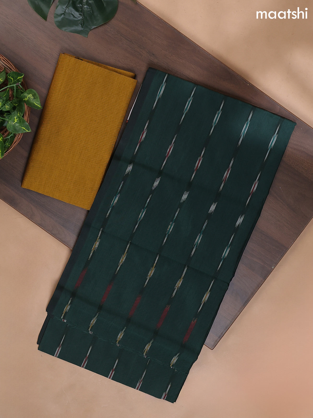 Green and Mustard Yellow Ikat Dress Material With Ikat Weaves