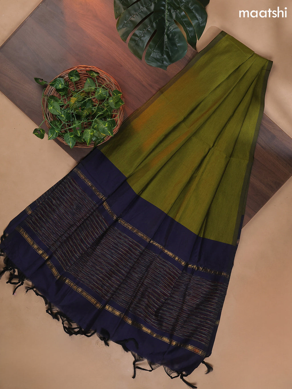Navy Blue and Mehendi Green Ikat Dress Material With Ikat Weaves