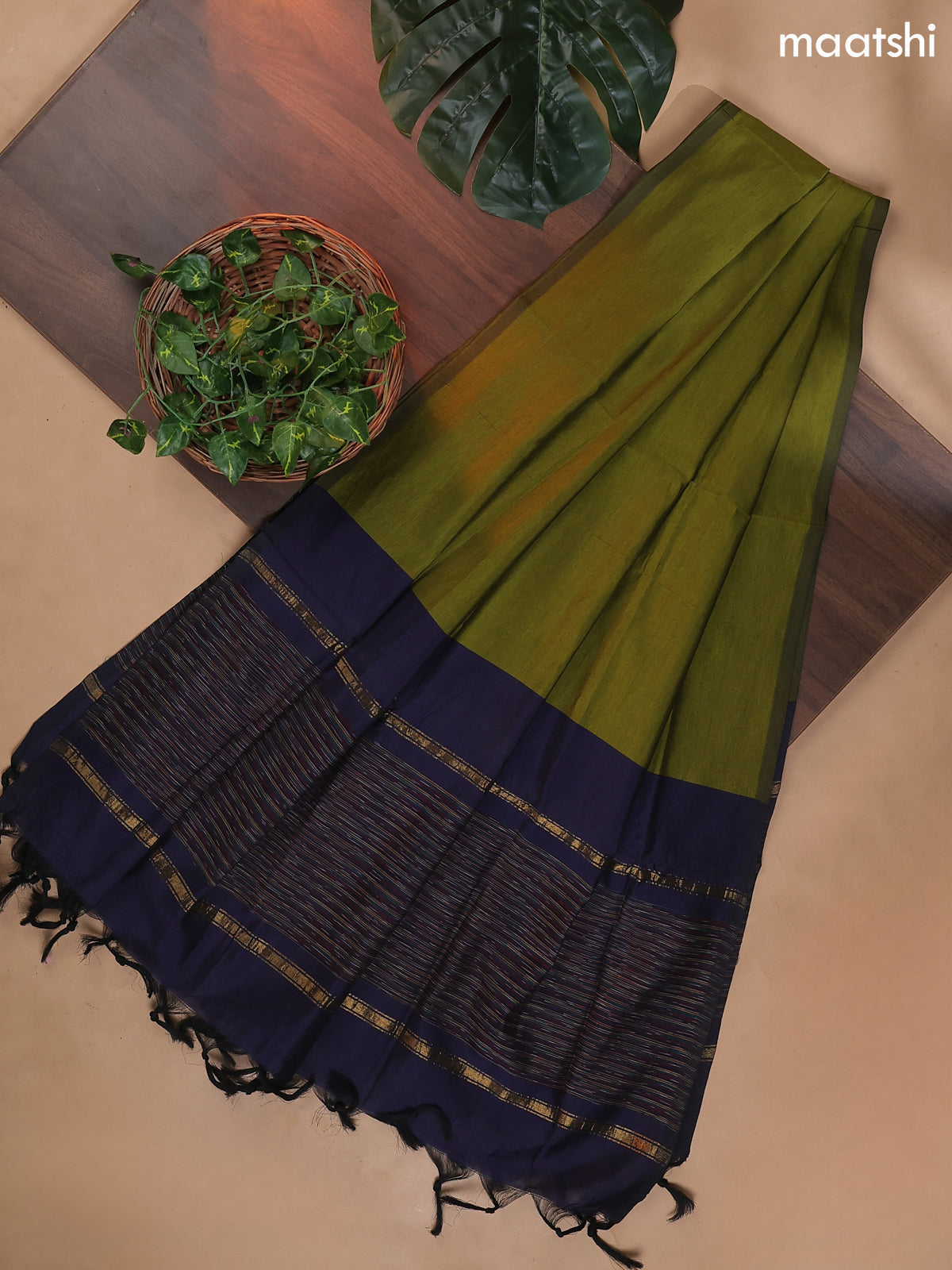 Navy Blue and Mehendi Green Ikat Dress Material With Ikat Weaves