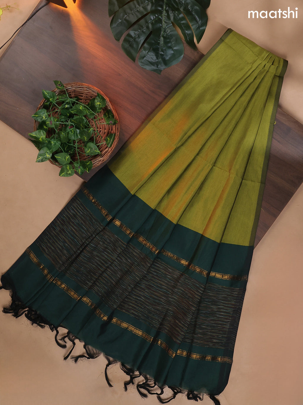 Dark Green and Mehendi Green Ikat Dress Material With Ikat Weaves