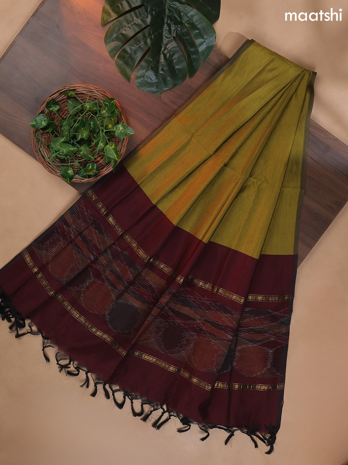 Deep Maroon and Mehendi Green Ikat Dress Material With Ikat Weaves