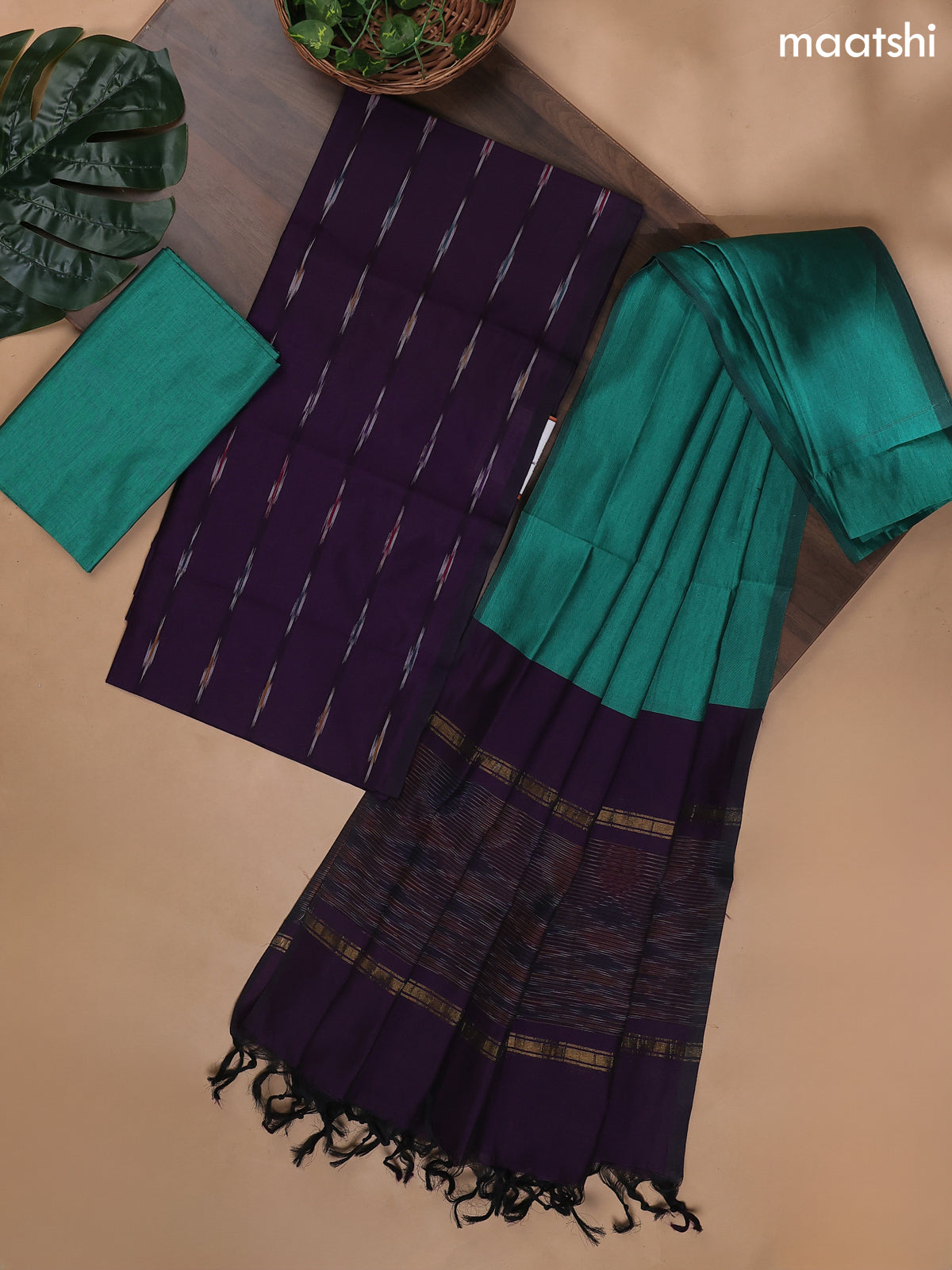 Deep Purple and Teal Green Ikat Dress Material With Ikat Weaves