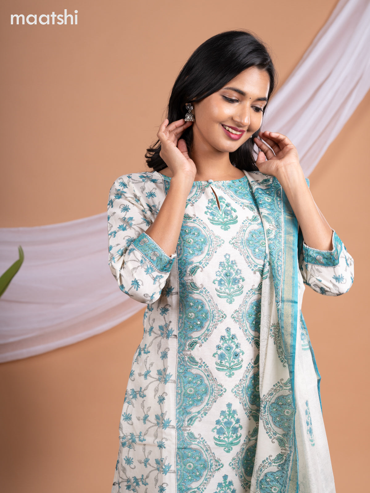 Chanderi salwar suit off white and teal blue shade with allover floral prints & beaded sequin work neck pattern and straight cut pant & printed dupatta