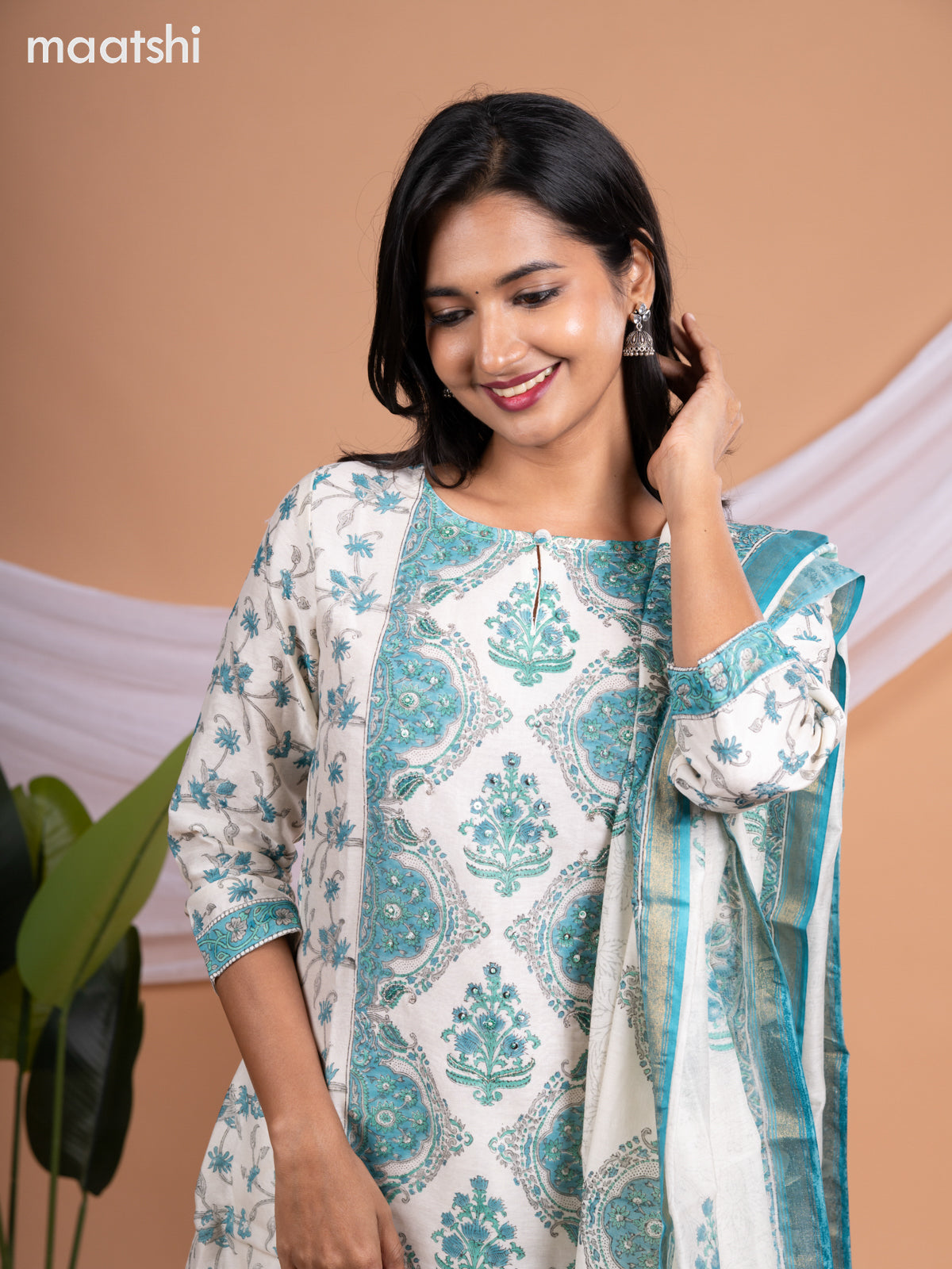 Chanderi salwar suit off white and teal blue shade with allover floral prints & beaded sequin work neck pattern and straight cut pant & printed dupatta