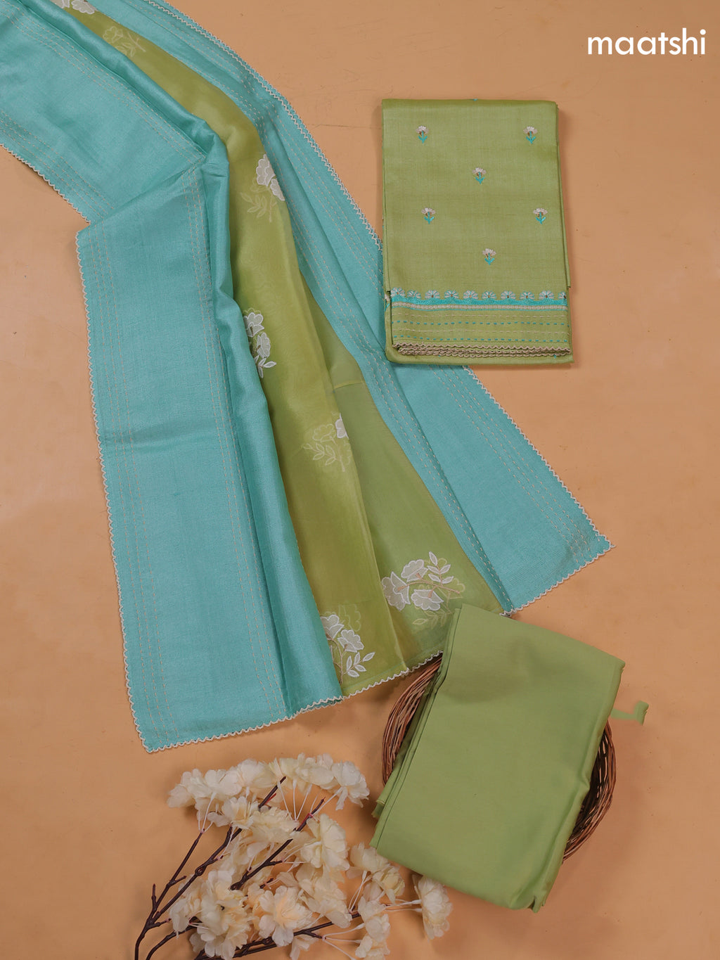Pista Green and Light Blue Pure Tussar Dress Material With Floral Embroidery Work Buttas