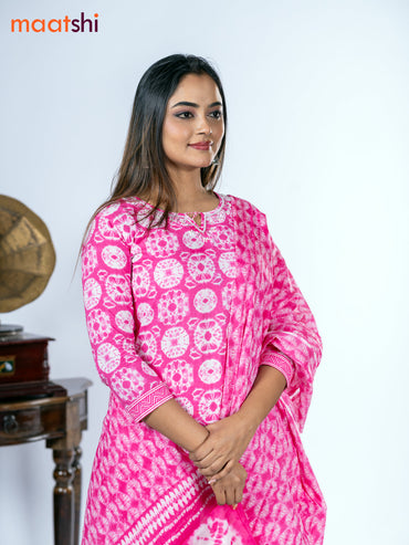 Cotton salwar suit pink with allover batik prints & embroidery zardosi work neck pattern and straight cut pant & dupatta
