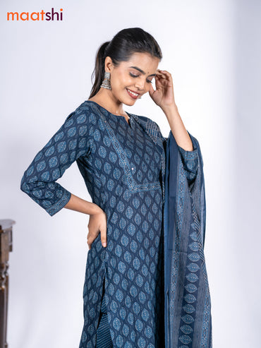 Cotton salwar suit dark peacock blue with allover leaf prints & mirror sequin work neck pattern and straight cut pant & dupatta