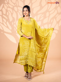 Crepe silk salwar suit lime green with allover bandhani prints & beaded work neck pattern and straight cut pant & dupatta