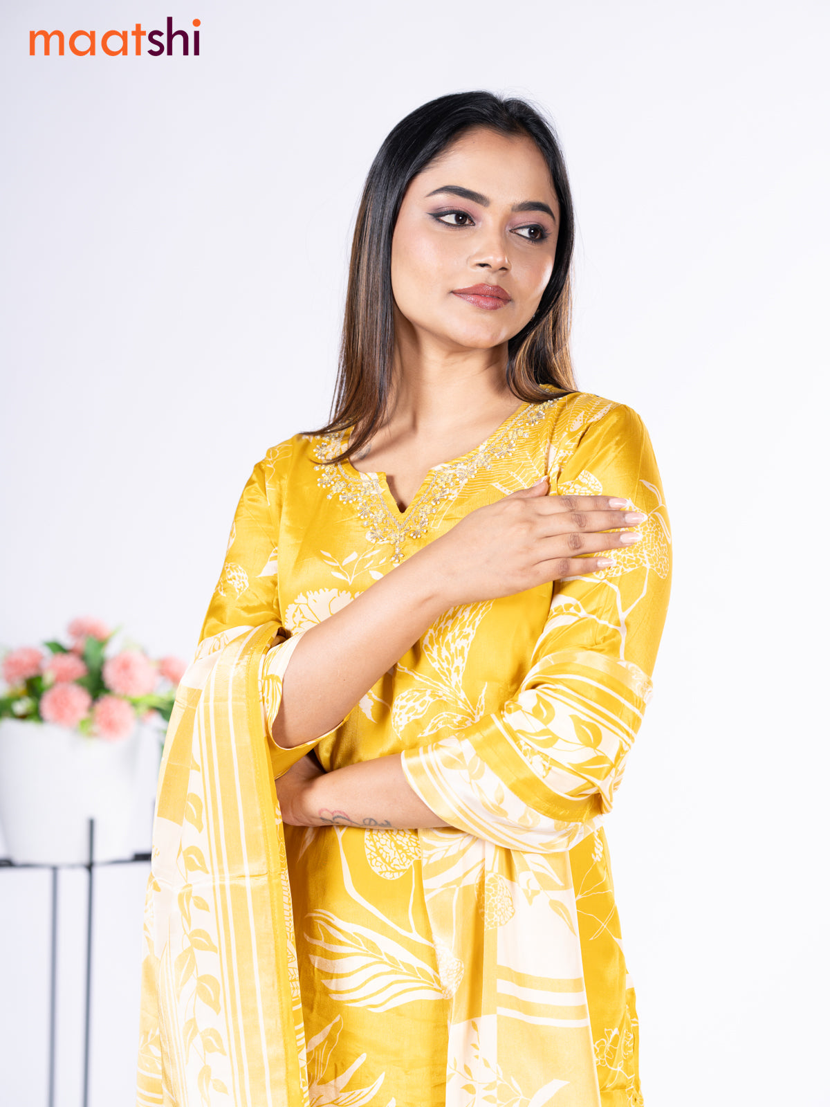 Crepe silk salwar suit mustard yellow with placement prints & beaded work neck pattern and straight cut pant & dupatta