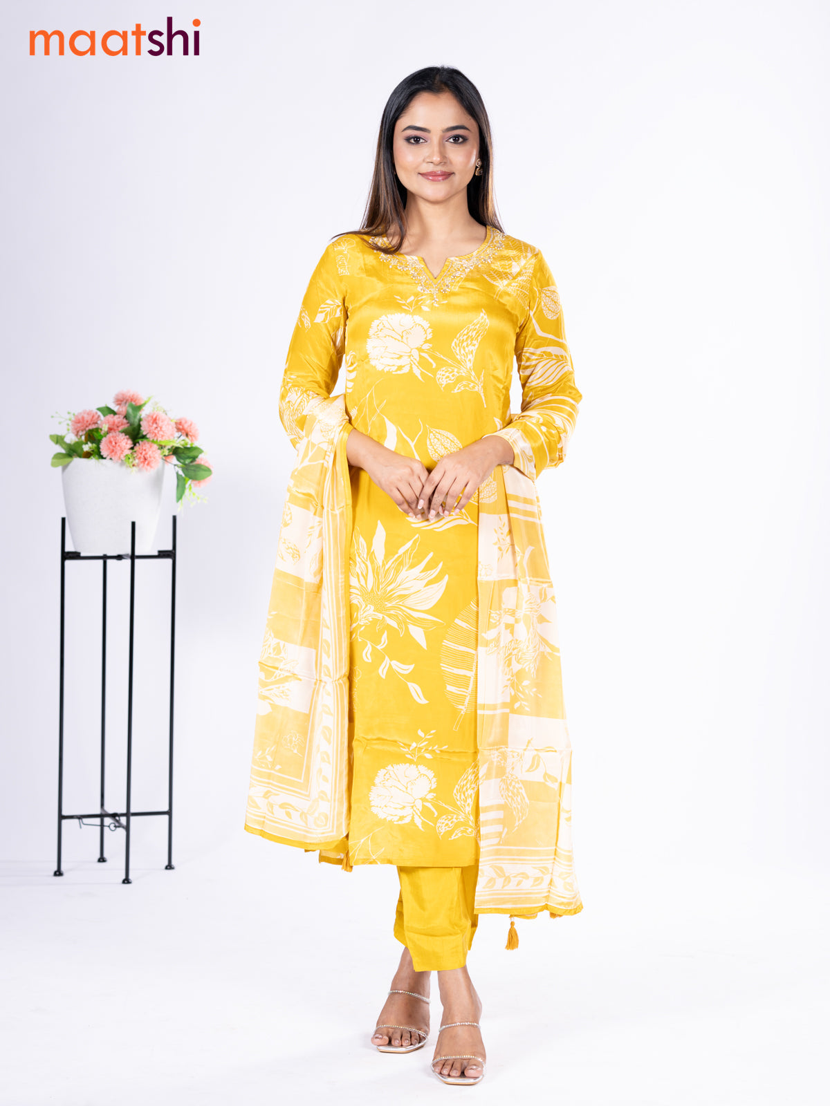 Crepe silk salwar suit mustard yellow with placement prints & beaded work neck pattern and straight cut pant & dupatta