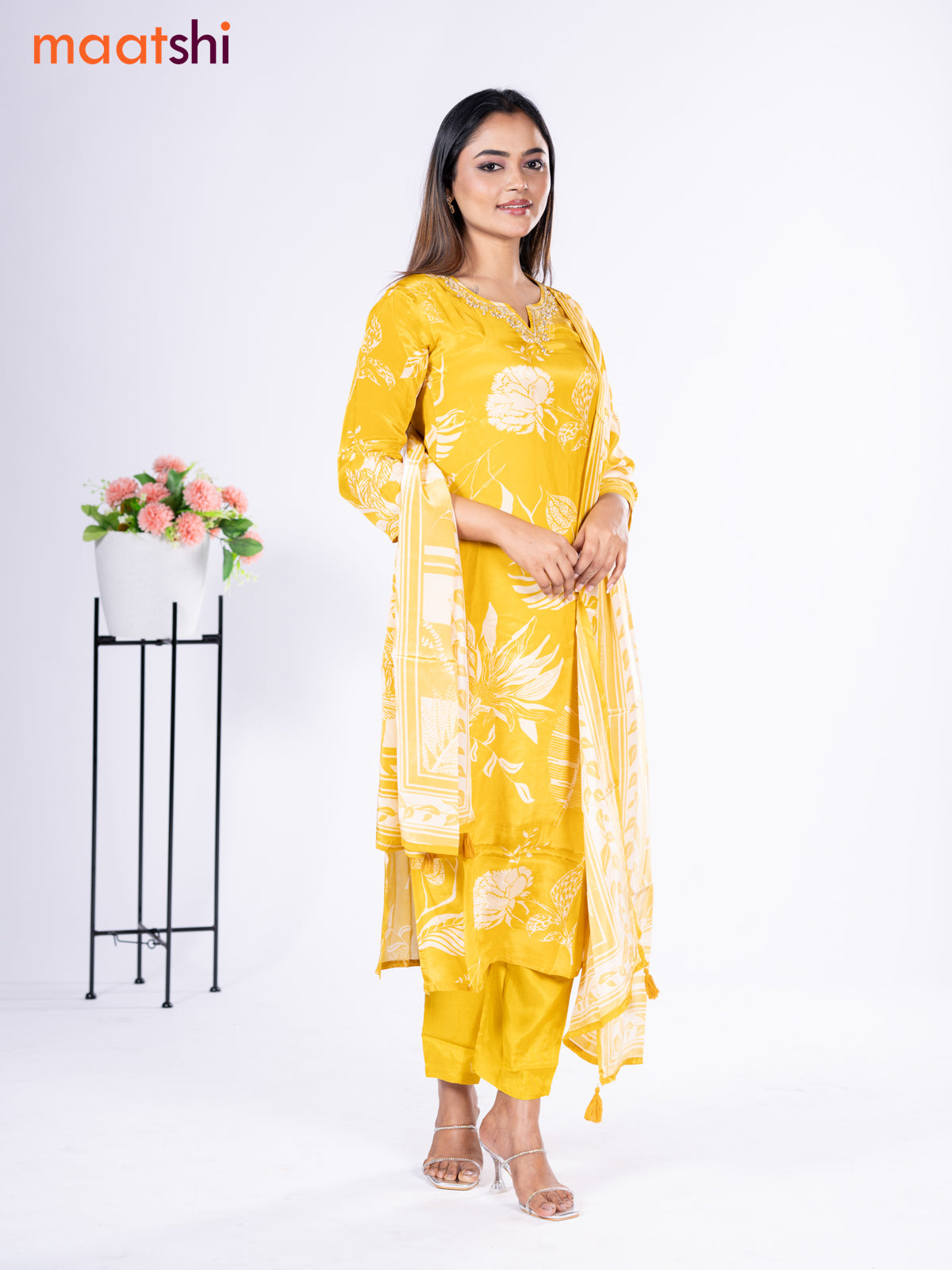 Crepe silk salwar suit mustard yellow with placement prints & beaded work neck pattern and straight cut pant & dupatta