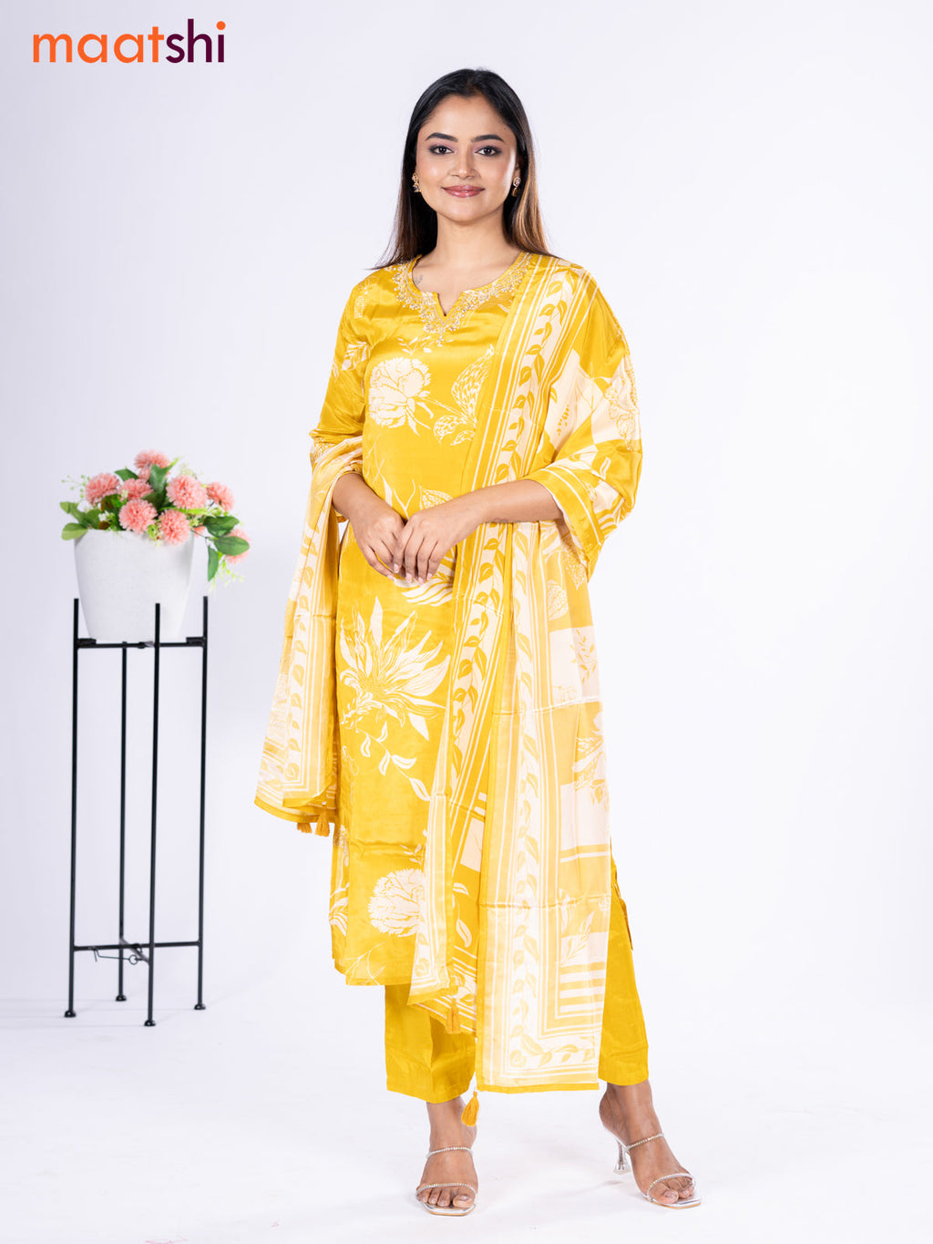 Crepe silk salwar suit mustard yellow with placement prints & beaded work neck pattern and straight cut pant & dupatta