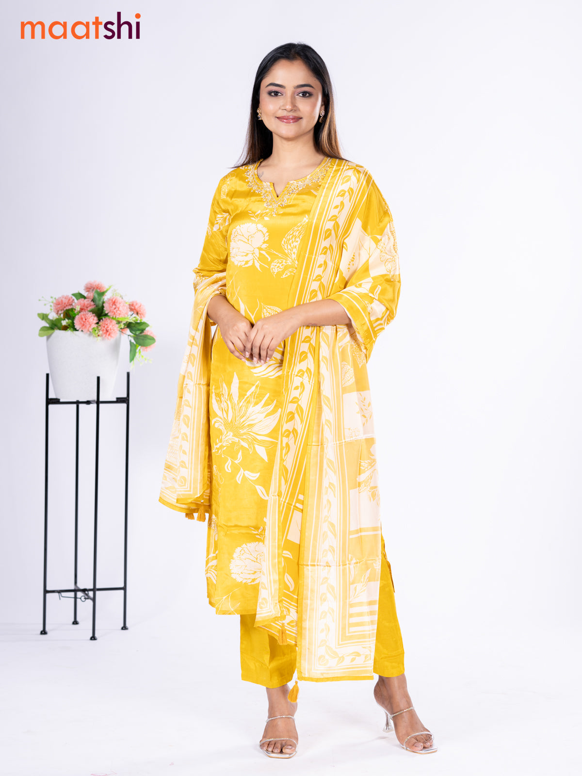 Crepe silk salwar suit mustard yellow with placement prints & beaded work neck pattern and straight cut pant & dupatta