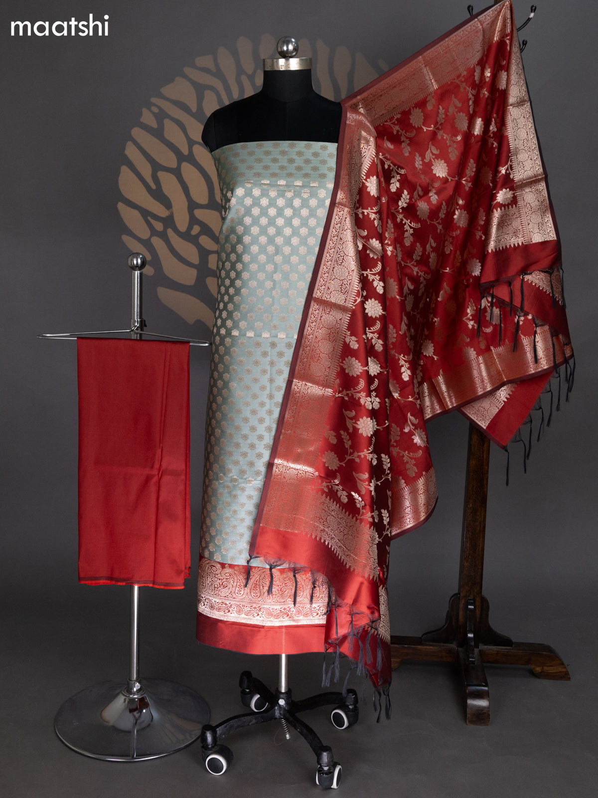 Elaichi Green and Maroon Banarasi Silk Dress Material With Allover Zari Buttas