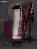 Elaichi Green and Deep Maroon Banarasi Silk Dress Material With Allover Zari Buttas