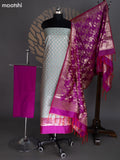 Pastel Green and Magenta Pink Banarasi Silk Dress Material With Allover Zari Buttas