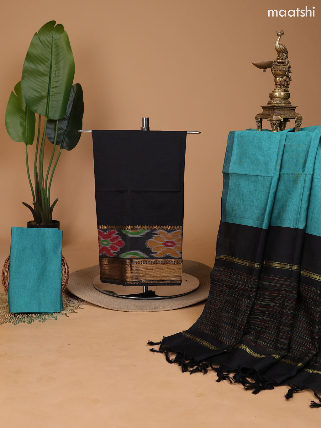 Black and Teal Green Ikat Dress Material With Plain Body & Ikat Weaves and Zari Border and Bottom & Dupatta
