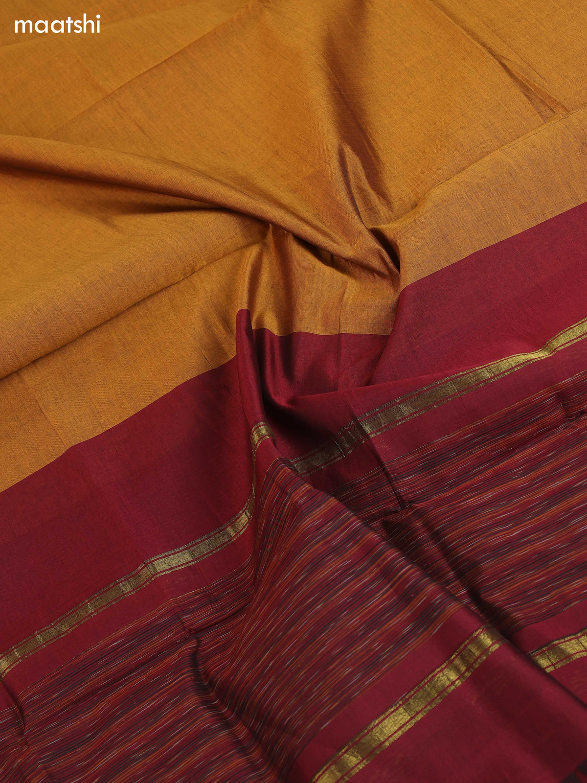 Maroon and Mustard Yellow Ikat Dress Material With Plain Body & Ikat Weaves Border and Bottom & Dupatta