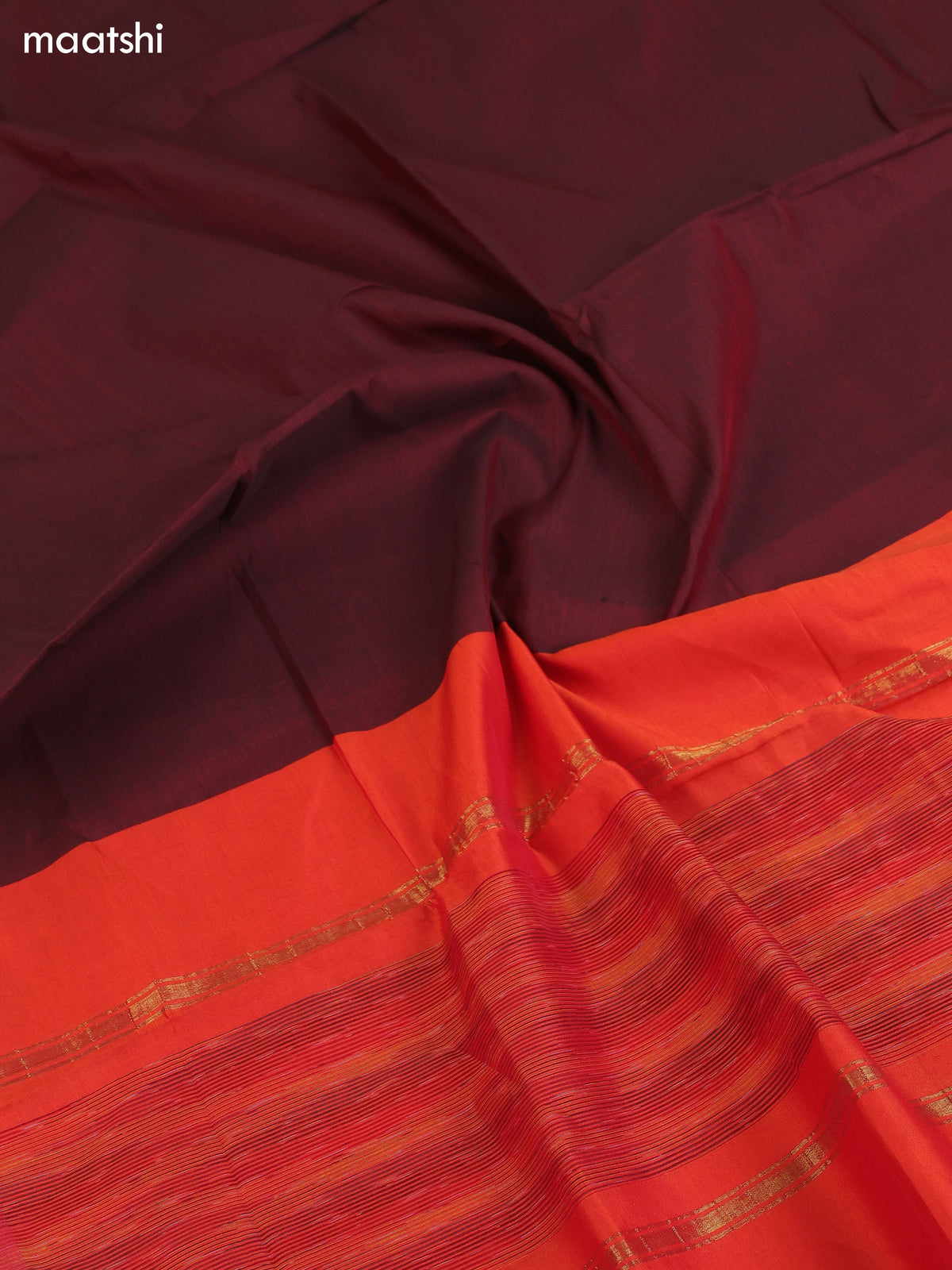 Rustic Orange and Brown Ikat Dress Material With Plain Body & Ikat Weaves Border and Bottom & Dupatta