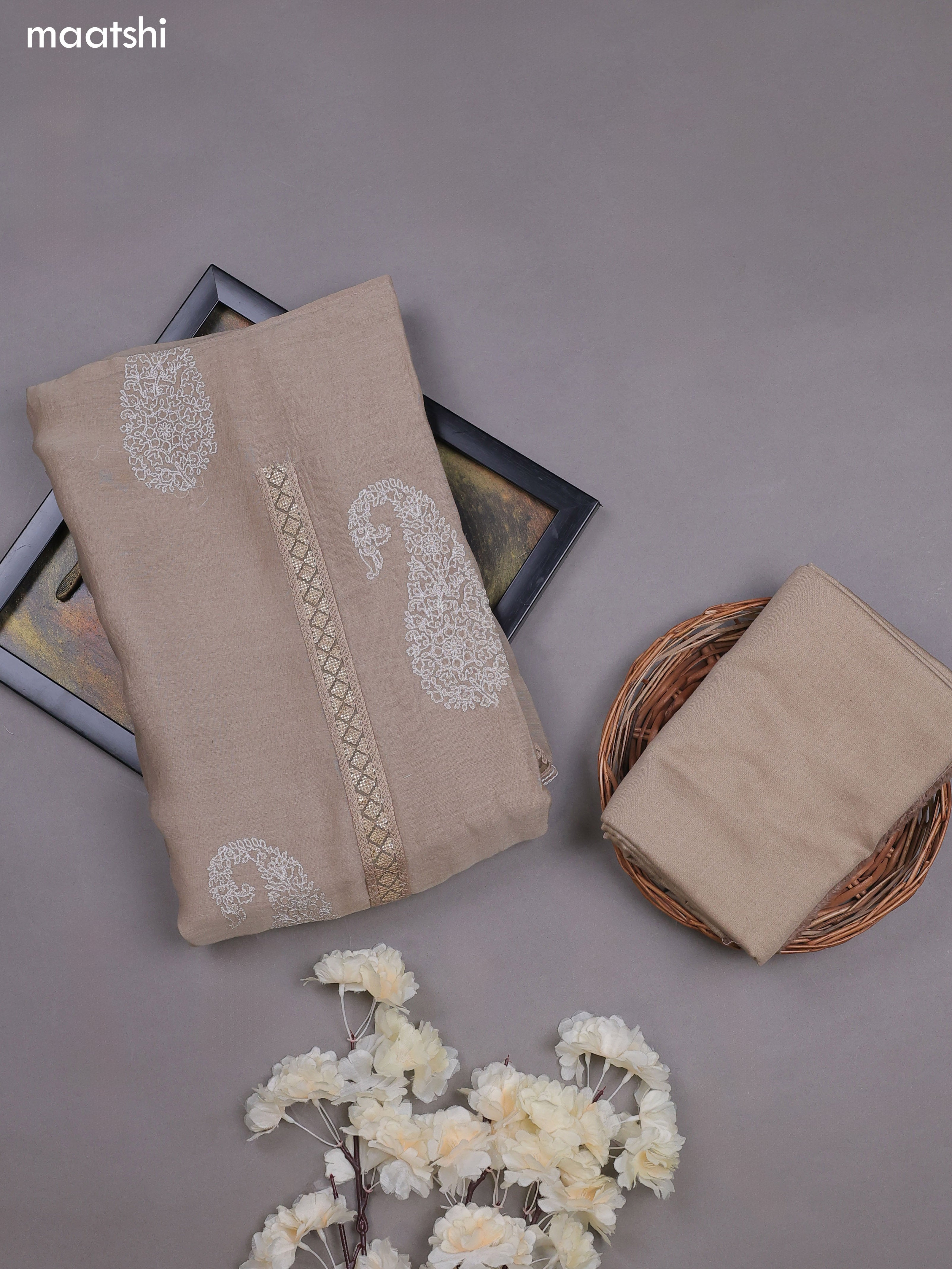 Pastel Brown Mul Chanderi Dress Materials With Pasiley Embroidery Work Butta Pattern