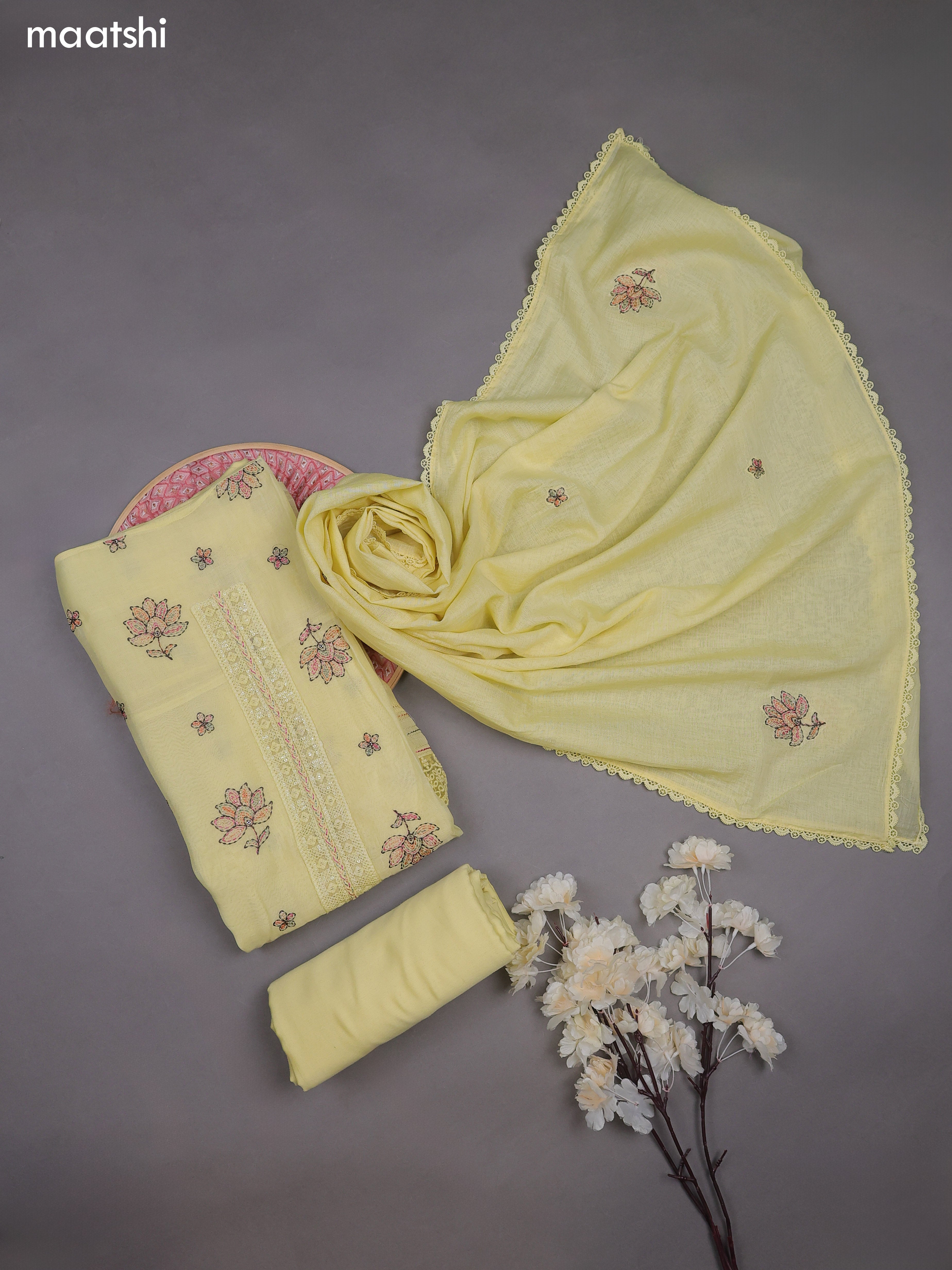 Pale Yellow Mul Chanderi Dress Materials With Floral Embroidery Work Butta Pattern