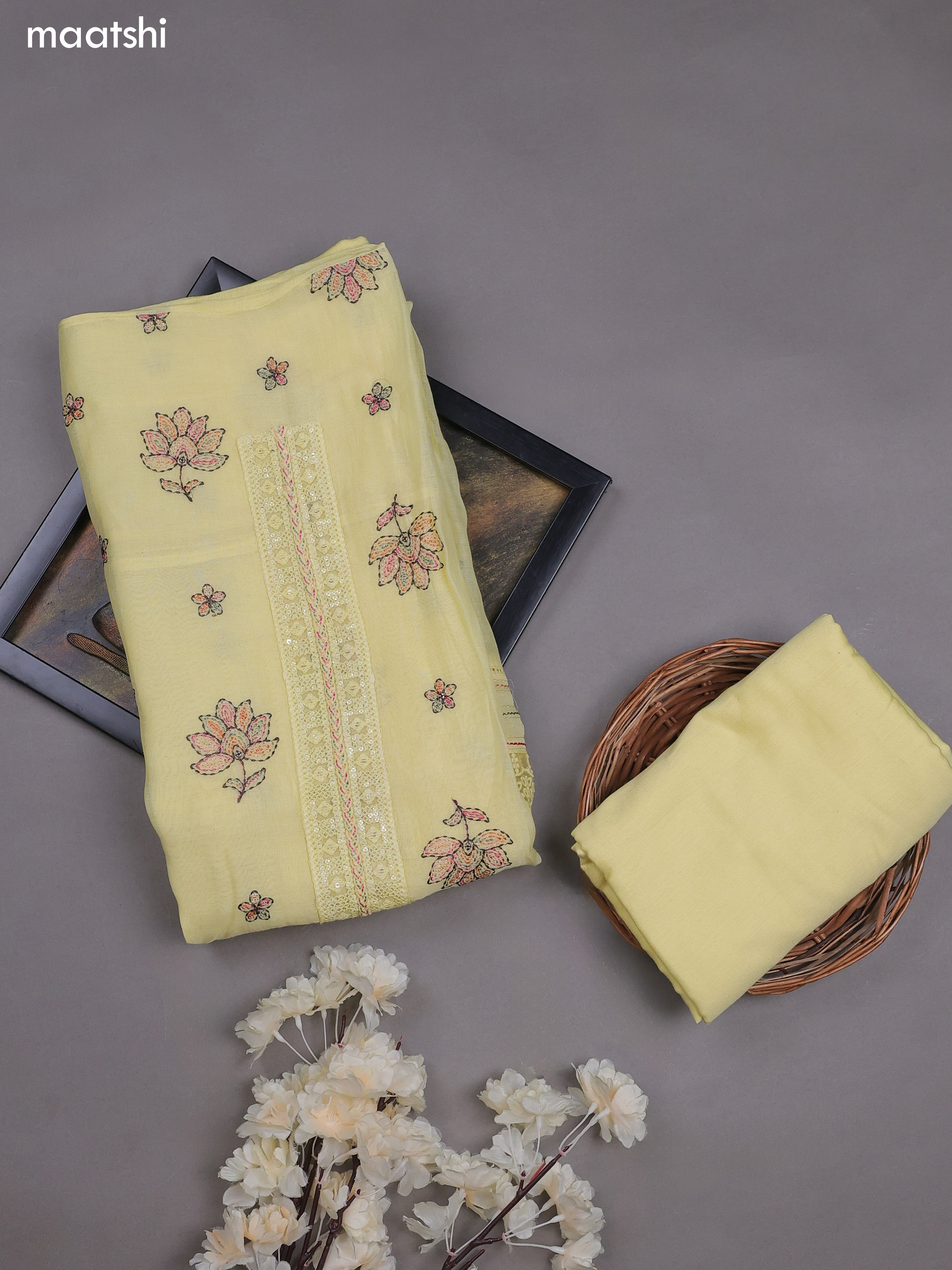 Pale Yellow Mul Chanderi Dress Materials With Floral Embroidery Work Butta Pattern