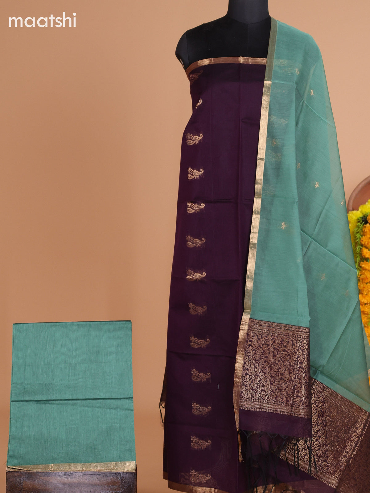 Deep Purple and Pastel Green Semi Silk Cotton Dress Material With Zari Buttas And Bottom & Dupatta