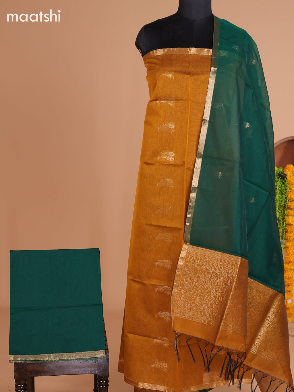 Mustard Yellow and Dark Green Semi Silk Cotton Dress Material With Zari Buttas and Bottom & Dupatta