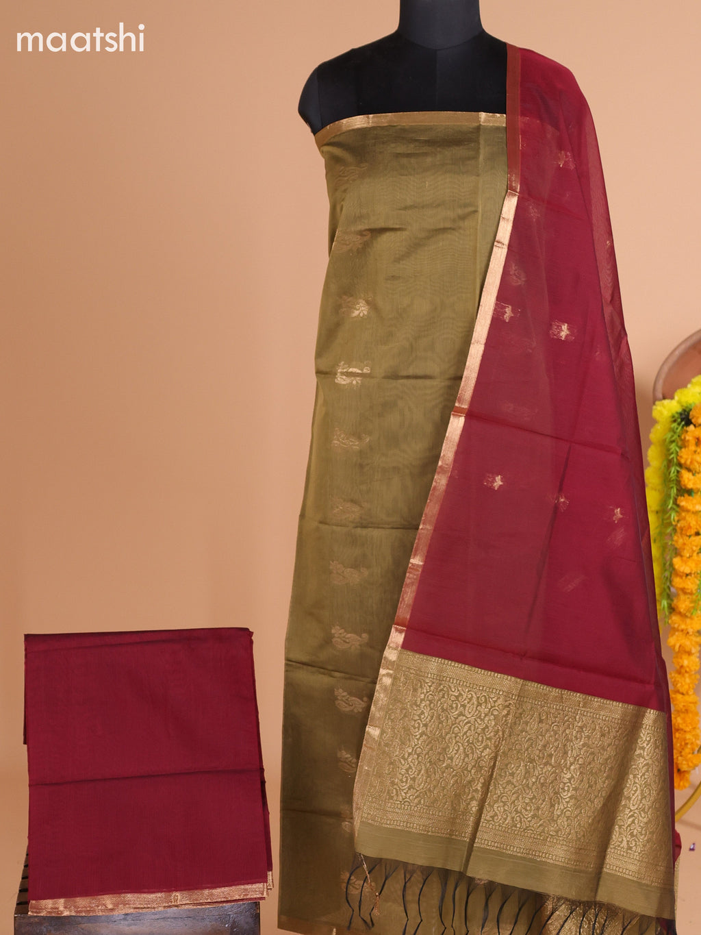 Dark Elaichi Green and Maroon Semi Silk Cotton Dress Material With Zari Buttas And Bottom & Dupatta
