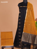 Black and Mustard Yellow Semi Silk Cotton Dress Material With Zari Buttas And Bottom & Dupatta