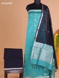 Pastel Green and Black Semi Silk Cotton Dress Material With Zari Buttas And Bottom & Dupatta