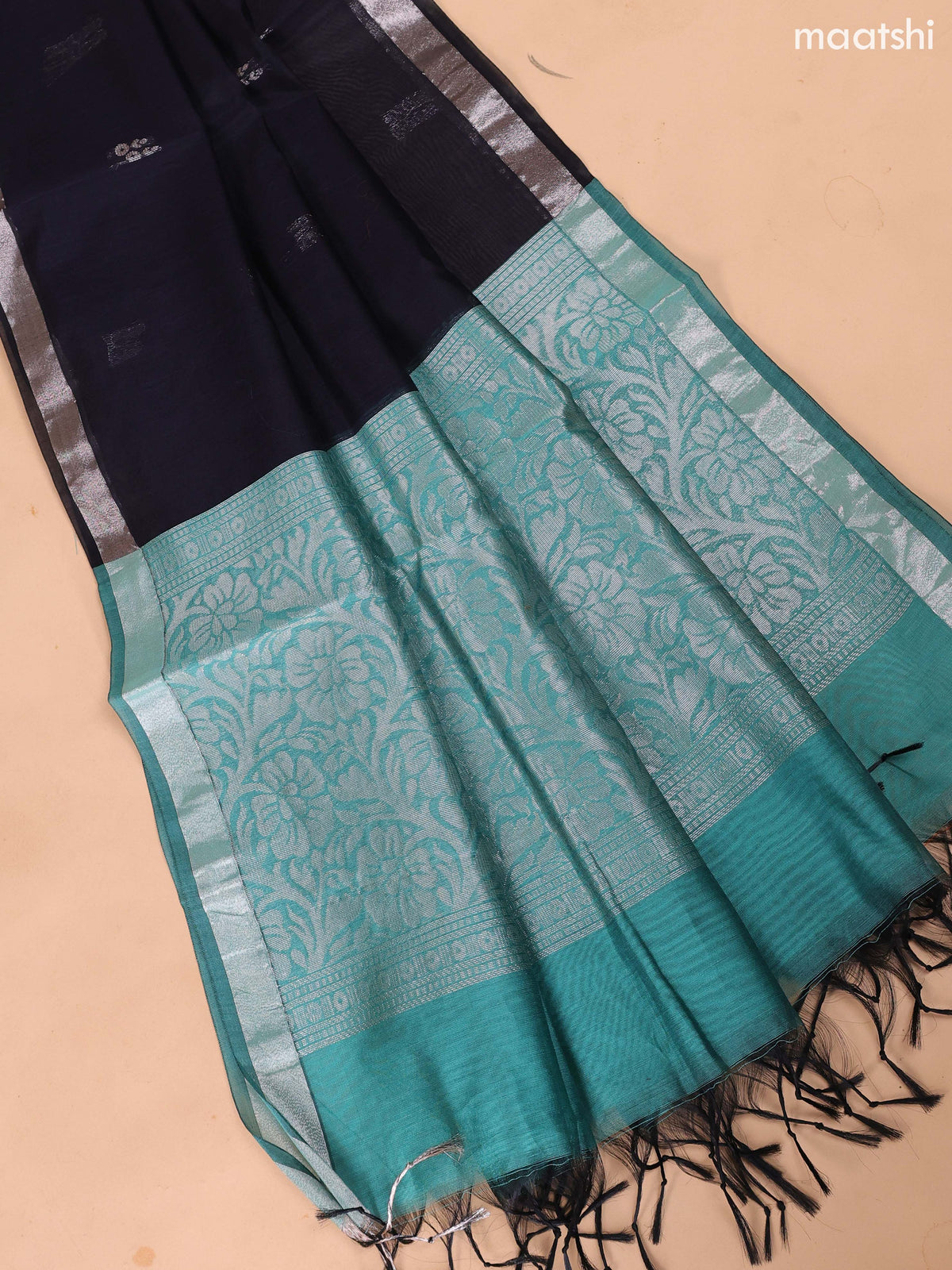 Pastel Green and Black Semi Silk Cotton Dress Material With Zari Buttas And Bottom & Dupatta