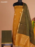 Mustard Yellow and Dark Mehendi Green Semi Silk Cotton Dress Material With Zari Buttas And Bottom & Dupatta