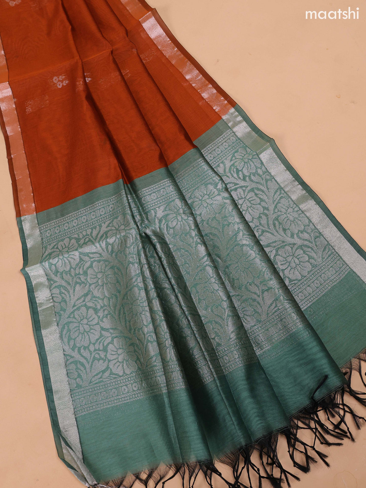 Pastel Green and Rustic Orange Semi Silk Cotton Dress Material With Zari Buttas And Bottom & Dupatta